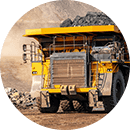 Mining vehicle driving on a dirt road