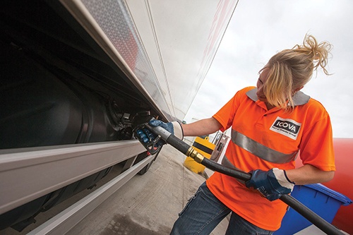 Person fueling tanker truck using with the Orpak Fleet Management Solution