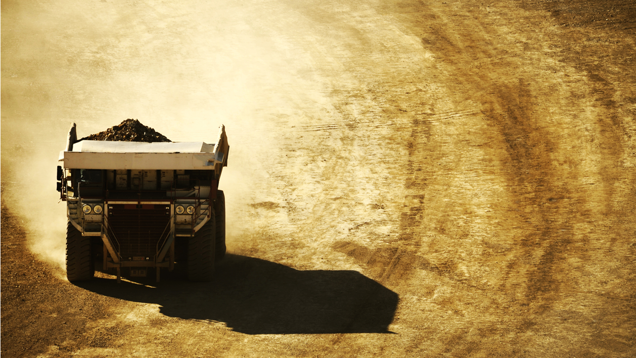 Huge Dump Truck in the Mining Area