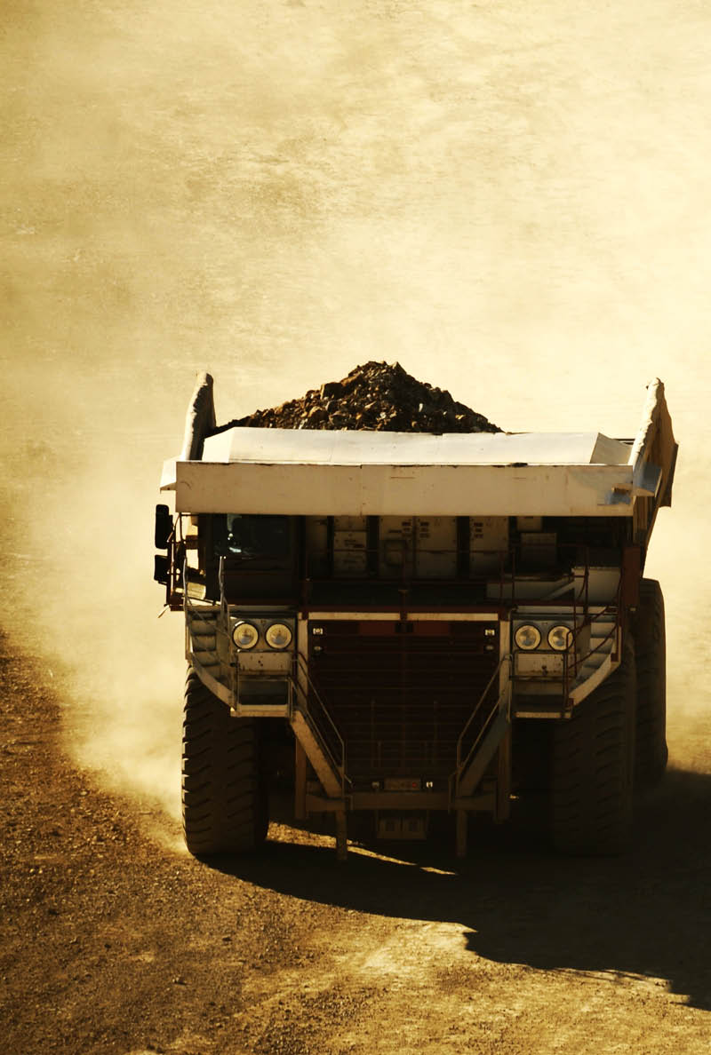 Huge Dump Truck in the Mining Area