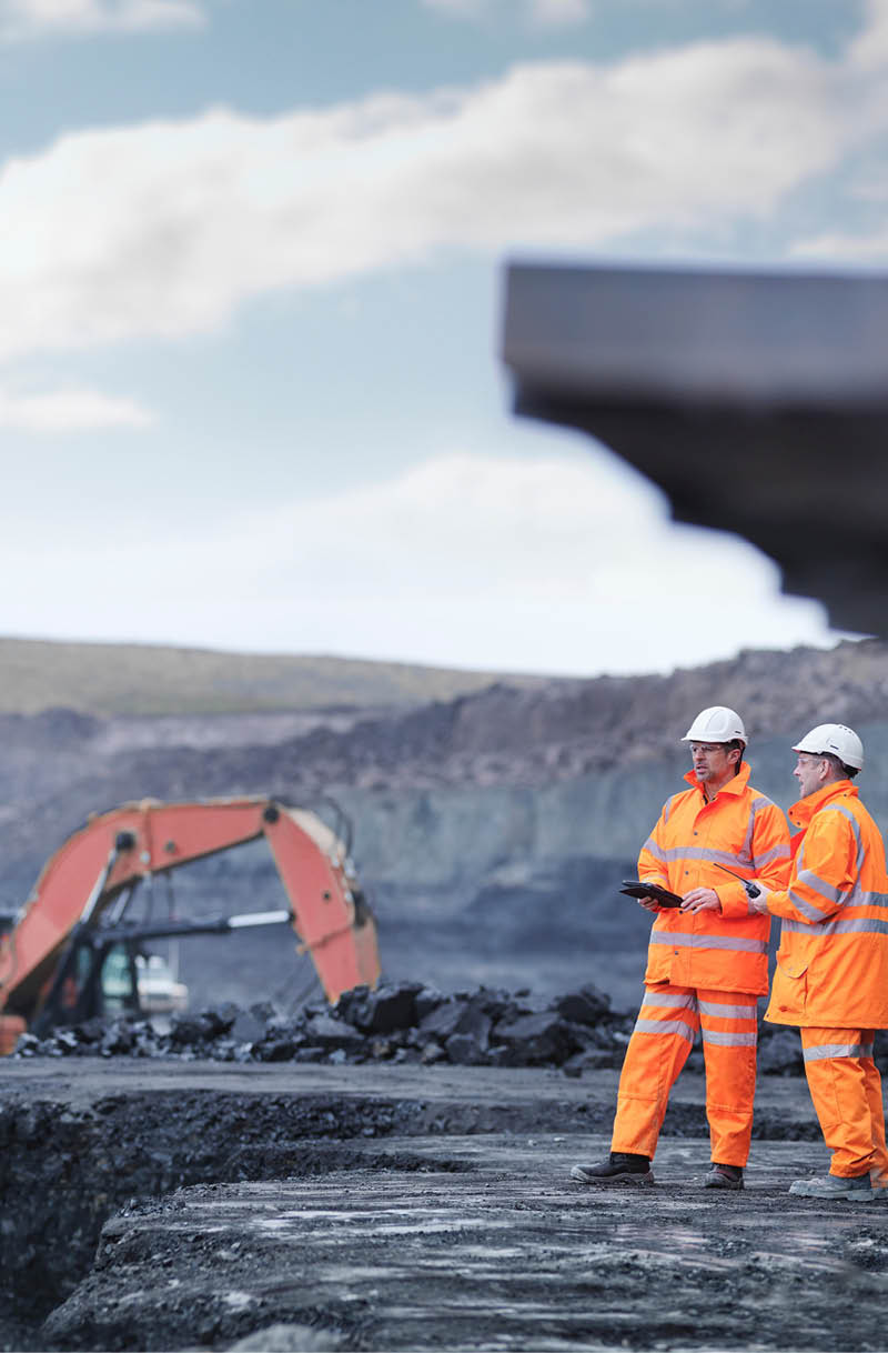 Miners in discussion in surface coal mine  Image downloaded by   at 22:04 on the 13 06 15