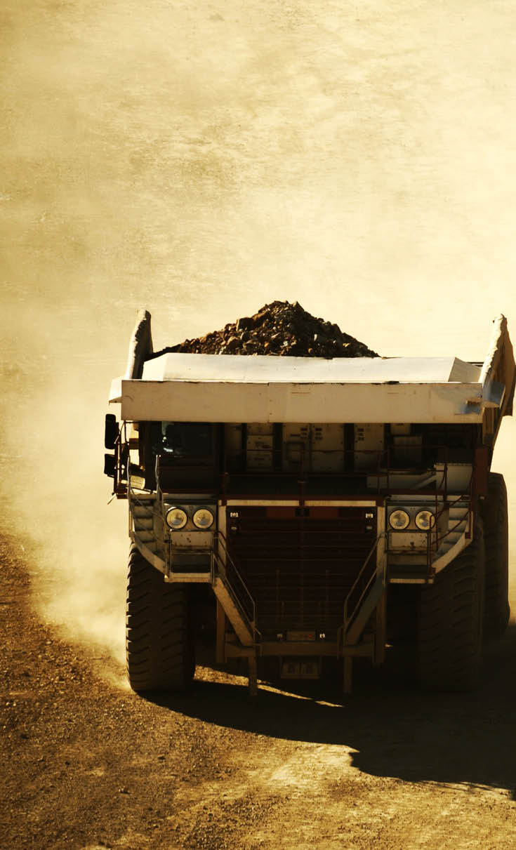 Huge Dump Truck in the Mining Area