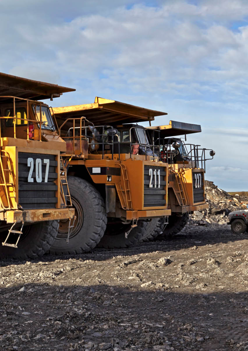 Portrait of foreman with walkie talkie working at quarry