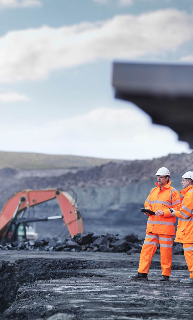 Miners in discussion in surface coal mine  Image downloaded by   at 22:04 on the 13 06 15